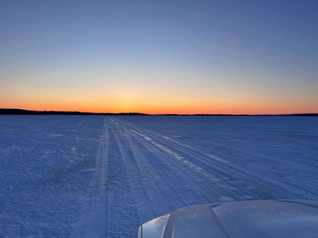 Sunset on a frozen lake