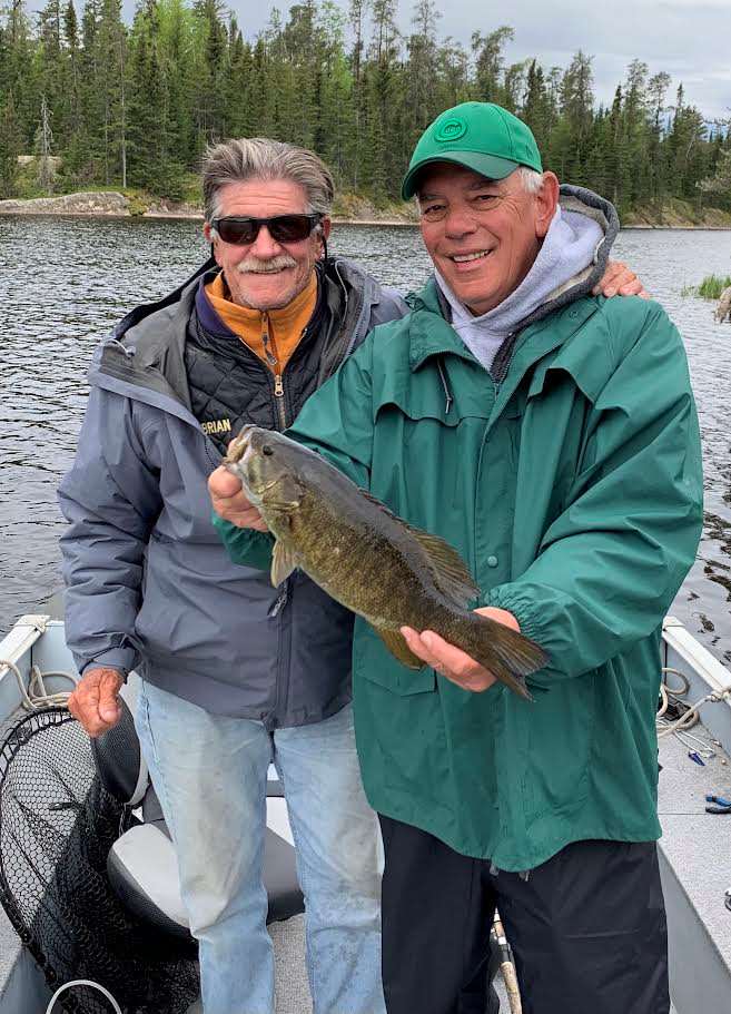 Rick and guide Brian fishing smallmouth bass in early June 2024.