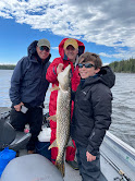 Man holding northern pike